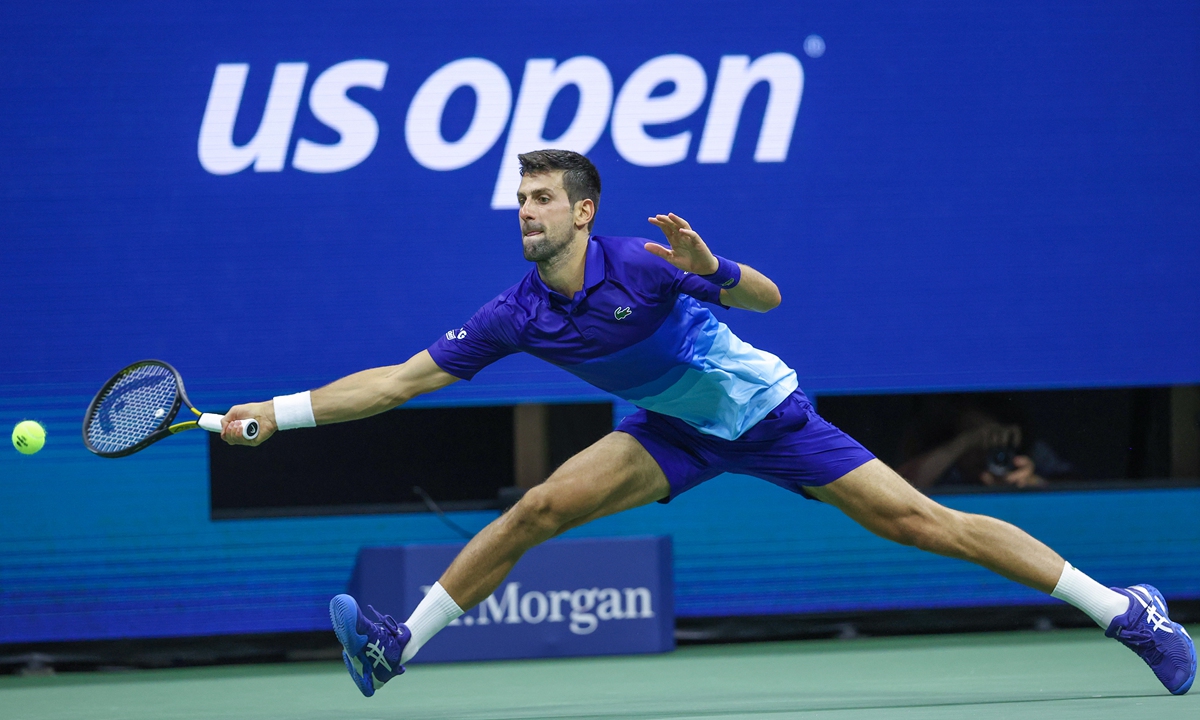Novak Djokovic returns the ball against Matteo Berrettini on Wednesday in New York City.  Photo: VCG