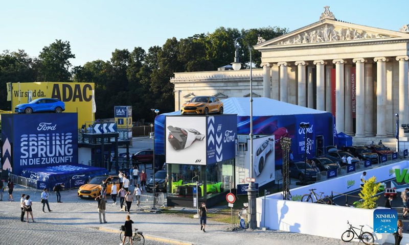 People visit the Ford outdoor booth during the International Motor Show Germany (IAA Mobility) in Munich, Germany, Sept. 8, 2021. The IAA Mobility, with the slogan What will move us next, is held here from Sept. 7 to 12. Photo: Xinhua 