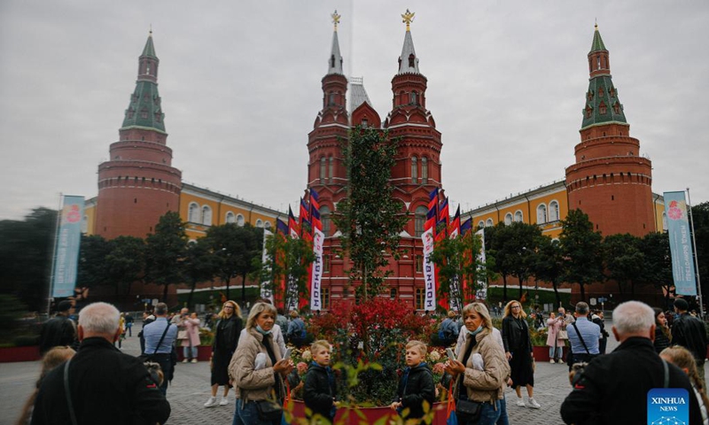 People take a selfie on Manezhnaya Square during the Moscow City Day celebrations in Moscow, Russia, Sept. 11, 2021. Moscow celebrated its 874th anniversary to honor the city's founding this weekend. Photo: Xinhua