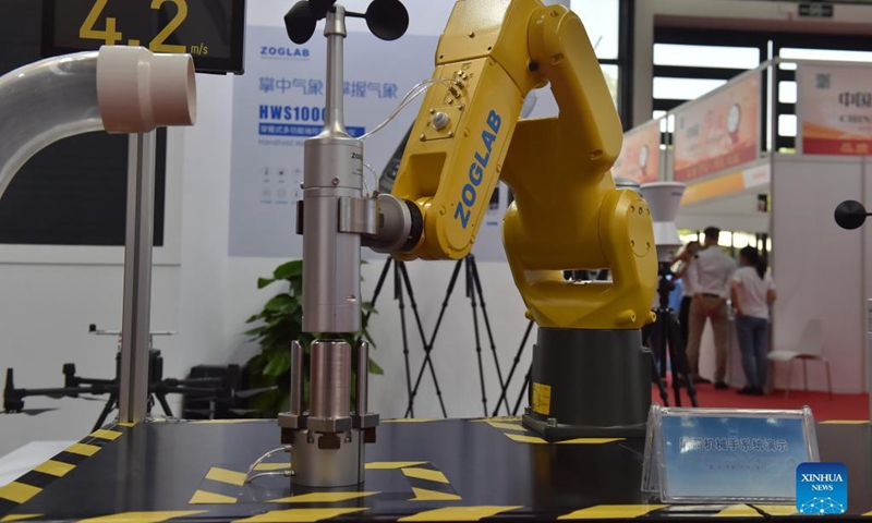Photo taken on Sept. 11, 2021 shows an mechanical arm at the 18th China-ASEAN Expo in Nanning, capital of south China's Guangxi Zhuang Autonomous Region. The 18th China-ASEAN Expo and China-ASEAN Business and Investment Summit kicked off Friday in Nanning, highlighting the building of a closer China-ASEAN community with a shared future.(Photo: Xinhua)