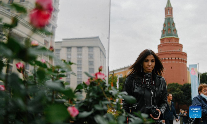 People take a selfie on Manezhnaya Square during the Moscow City Day celebrations in Moscow, Russia, Sept. 11, 2021. Moscow celebrated its 874th anniversary to honor the city's founding this weekend. Photo: Xinhua