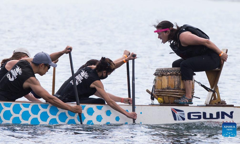 Contestants paddle in the Lake Ontario during the 2021 Toronto International Dragon Boat Race Festival in Toronto, Canada, on Sept. 11, 2021. Peddlers from Canada, the United States, the Caribbean Islands, Europe and Asia participated in the event which kicked off on Saturday.Photo: Xinhua