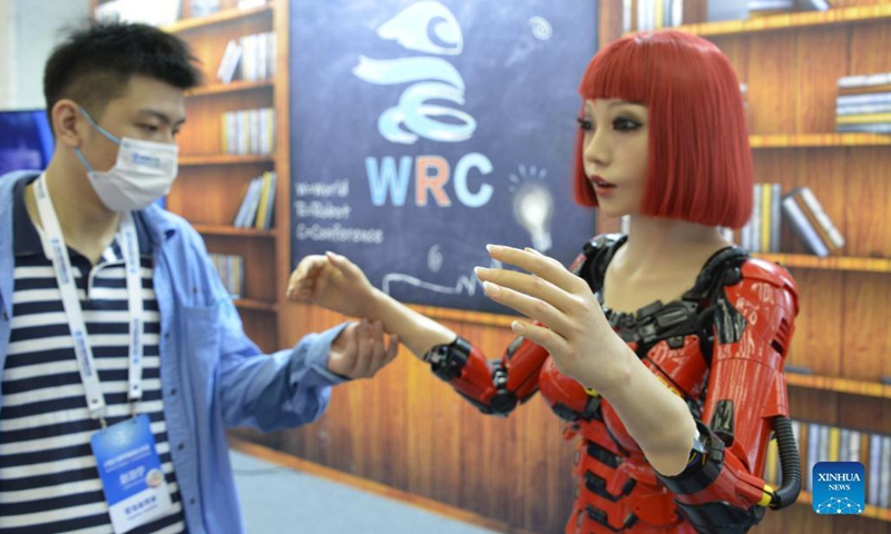 Photo taken on Sept. 12, 2021 shows a service robot displayed at the World Robot Conference held in Beijing, capital of China. The 2021 World Robot Conference is held in Beijing from Sept. 10 to 13. More than 110 enterprises and scientific research institutions brought over 500 products to the exhibition.(Photo: Xinhua)