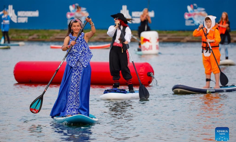 People take part in the Open Water SUP Fest 2021 in Moscow, Russia, on Sep. 12, 2021.Photo: Xinhua 