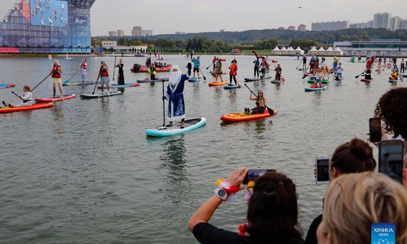 People take part in the Open Water SUP Fest 2021 in Moscow, Russia, on Sep. 12, 2021.Photo: Xinhua 