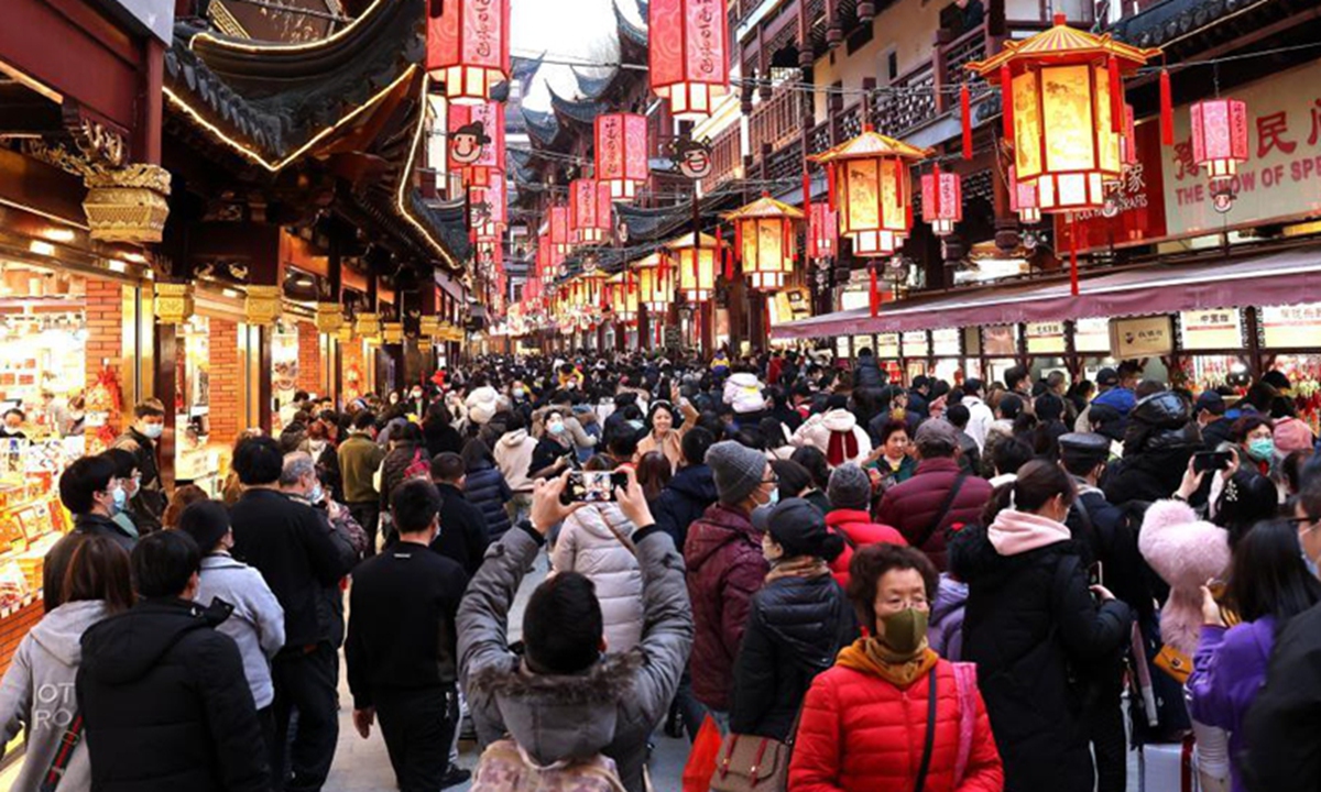 Tourists visit the Yuyuan Garden scenic area in east China's Shanghai, Feb. 17, 2021. Shanghai recorded over 4.92 million tourist visits during the seven-day holiday since Feb. 11, bouncing back to 96 percent of the number in the Chinese Lunar New Year holiday in 2019 before the COVID-19 epidemic, according to the city's administration of culture and tourism. Over 81 percent of the visitors were locals, and the total tourism revenue reached 5.67 billion yuan (about 877 million U.S. dollars).Photo:Xinhua
