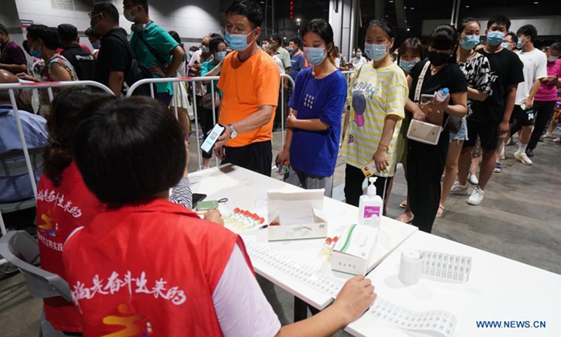 People register for COVID-19 tests at a testing site in Nanjing, East China's Jiangsu Province on July 21, 2021. Photo: Xinhua