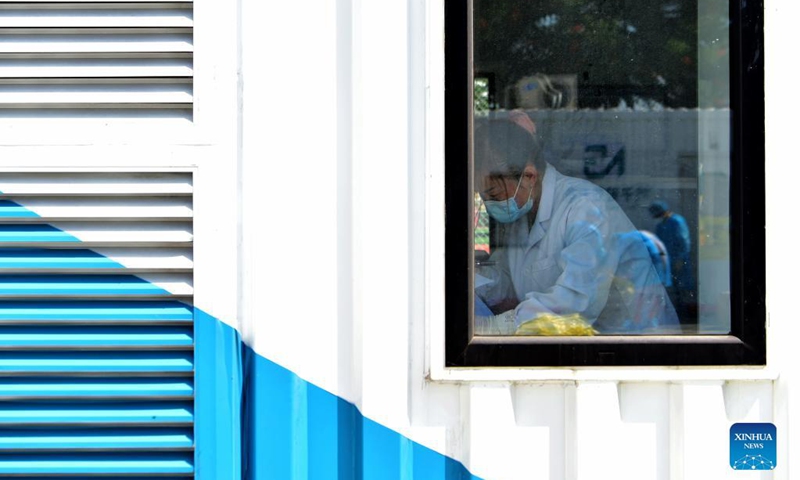 A staff member works in a PCR (polymerase chain reaction) lab for nucleic acid testing in Xianyou County, southeast China's Fujian Province, Sept. 14, 2021. Three PCR labs have been built in the county to boost nucleic acid detection capacity.Photo:Xinhua