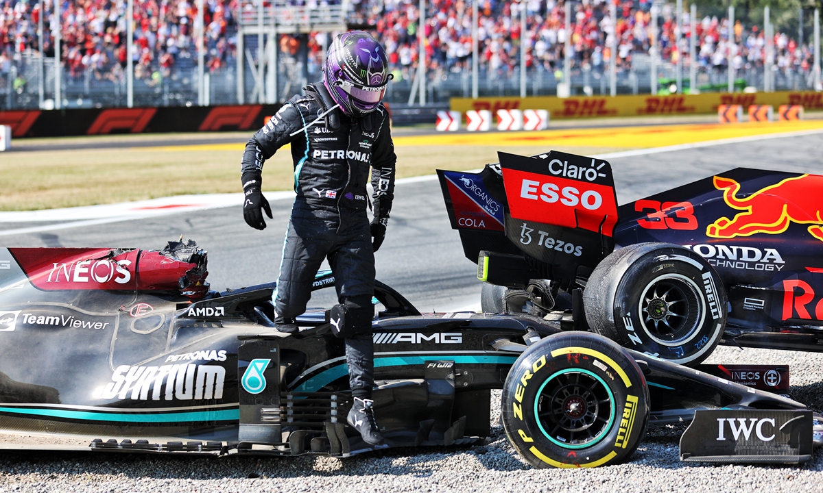 Lewis Hamilton gets out of his car following a collision with Max Verstappen. Photo: VCG