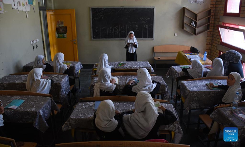 Afghan girls attend a class at a local school in Mazar-i-Sharif, capital of Balkh province, Afghanistan, Sept. 14, 2021. (Photo: Xinhua)