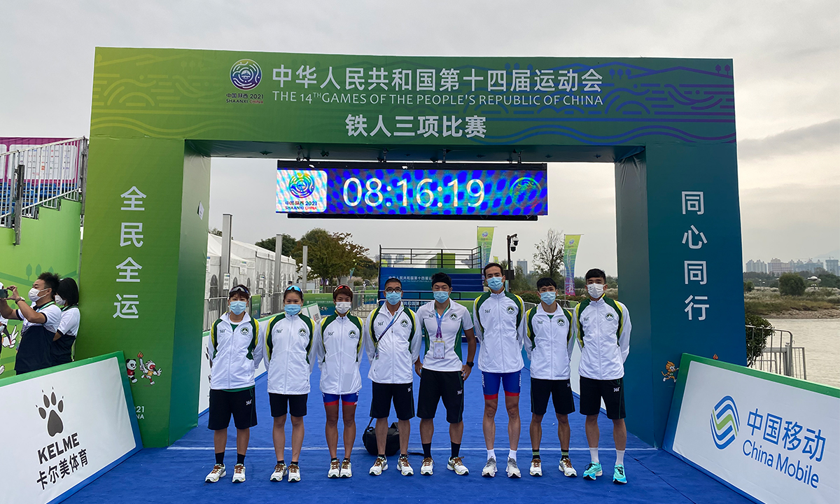 Hoi Long(left three)poses with Macao team mates at the 14th National Games of China in northwest Shaanxi Province. Photo: Courtesy of Hoi Long