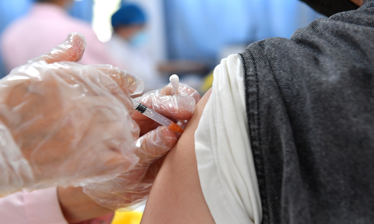A citizen receives vaccine at a center for disease control in Xiayi county, Central China's Henan Province, on August 2, 2021. Photo: IC