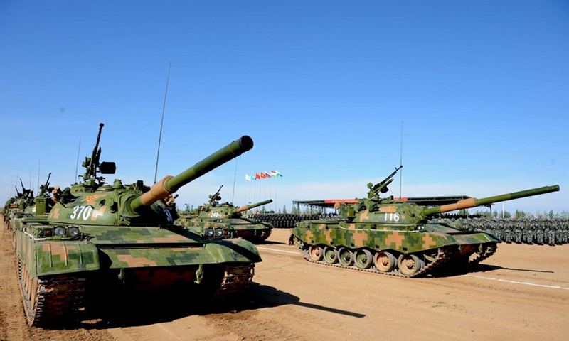 Chinese military vehicles attend the closing ceremony of the Peace Mission - 2014 military drill in Zhurihe, Inner Mongolia, north China, Aug. 29, 2014.(Photo: Xinhua)