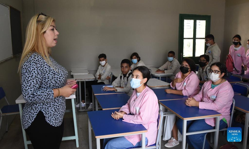 Students wearing face masks attend a class on the first day of a new school year at a school in Tunis, Tunisia, on Sept. 15, 2021.(Photo: Xinhua)