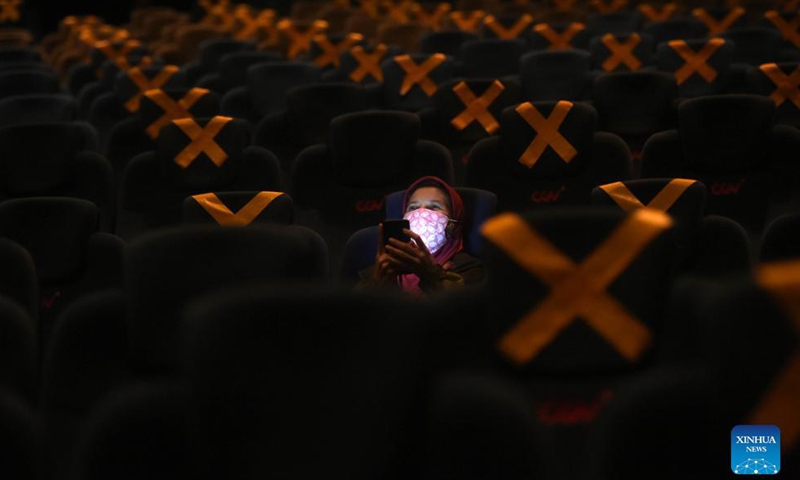 Seat distancing is applied at a movie theater in Jakarta, Indonesia, Sept. 16, 2021. The administration of Indonesias's capital Jakarta on Thursday started conducting its pilot cinema reopening program as the number of daily COVID-19 cases in the city was declining, a city official said.Photo:Xinhua