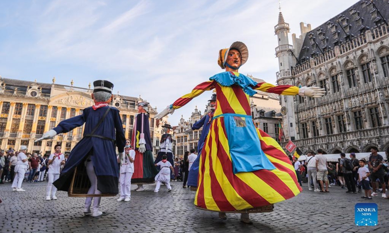 The giants perform during the Folklorissimo, or the Festival of Folklore, at the Grand-Place in Brussels, Belgium, on Sept. 18, 2021. (Xinhua/Zheng Huansong) 