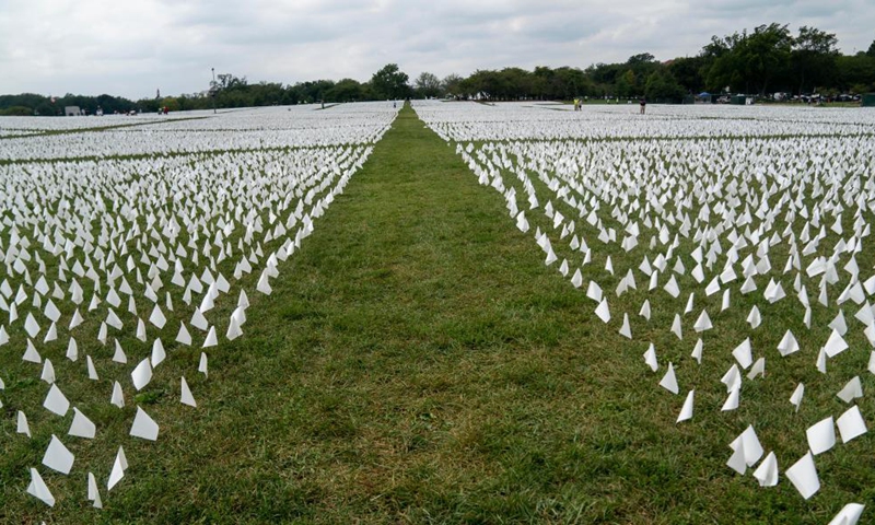 White flags are seen on the National Mall in Washington, D.C., the United States, on Sept. 16, 2021. More than 660,000 white flags were installed here to honor the lives lost to COVID-19 in the United States.Photo:Xinhua