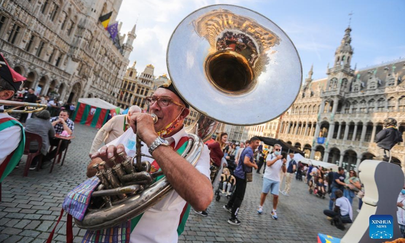 A member of a band performs during the Folklorissimo, or the Festival of Folklore, at the Grand-Place in Brussels, Belgium, on Sept. 18, 2021. (Xinhua/Zheng Huansong)
