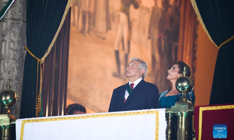 Mexican President Andres Manuel Lopez Obrador (L) and his wife attend the Independence Day celebrations in Mexico City, capital of Mexico, Sept. 15, 2021.Photo:Xinhua