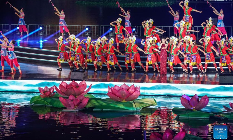 People perform during the opening ceremony of a lantern fair celebrating the Mid-Autumn Festival in Zhouzhuang Township of Kunshan City, east China's Jiangsu Province, Sept. 16, 2021.Photo:Xinhua