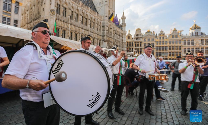 Members of a band perform during the Folklorissimo, or the Festival of Folklore, at the Grand-Place in Brussels, Belgium, on Sept. 18, 2021. (Xinhua/Zheng Huansong) 