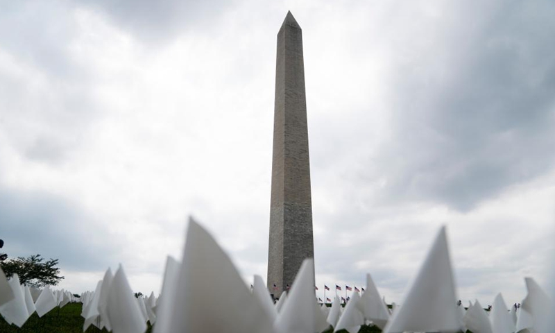 White flags are seen on the National Mall in Washington, D.C., the United States, on Sept. 16, 2021. More than 660,000 white flags were installed here to honor the lives lost to COVID-19 in the United States.Photo:Xinhua