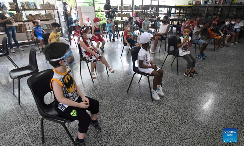 Children stay for observation after getting vaccinated against COVID-19 at a school in Havana, Cuba, Sep 16, 2021.Photo:Xinhua