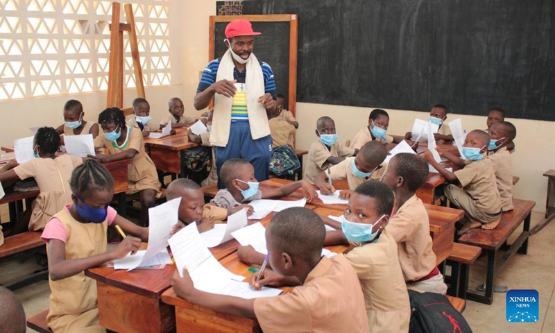 Children attend a class in their school on the first day of a new school year in the village of Djegbadji in Ouidah, Benin, on Sept. 20, 2021.(Photo: Xinhua)