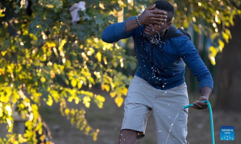 A man washes his face at a migrant camp near the border with the US in Ciudad Acuna, Mexico, Sep 24, 2021. Many of the migrants at the camp of Ciudad Acuna, near the border with the U.S., may try chances to enter the United States.Photo:Xinhua