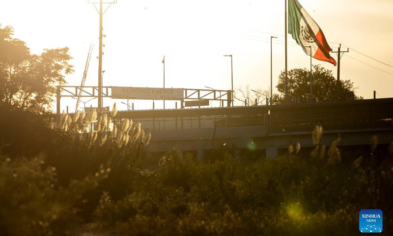 A large Mexican flag flies near the border with the US in Ciudad Acuna, Mexico, Sep 24, 2021. Many of the migrants at the camp of Ciudad Acuna, near the border with the US, may try chances to enter the United States.Photo:Xinhua