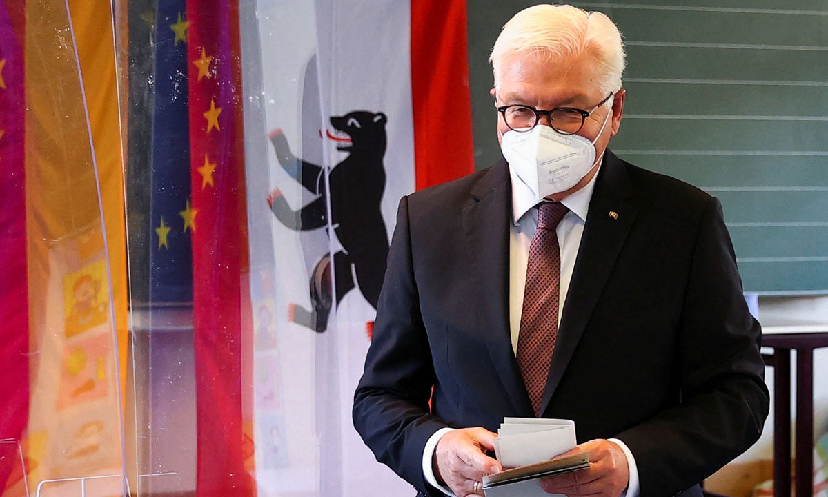 German President Frank-Walter Steinmeier votes at a polling station in Berlin during general elections on Sunday. Polls have already opened in Germany as voters choose a new parliament. The outcome will determine who gets to replace Angela Merkel after almost 16 years as chancellor. Photo: VCG