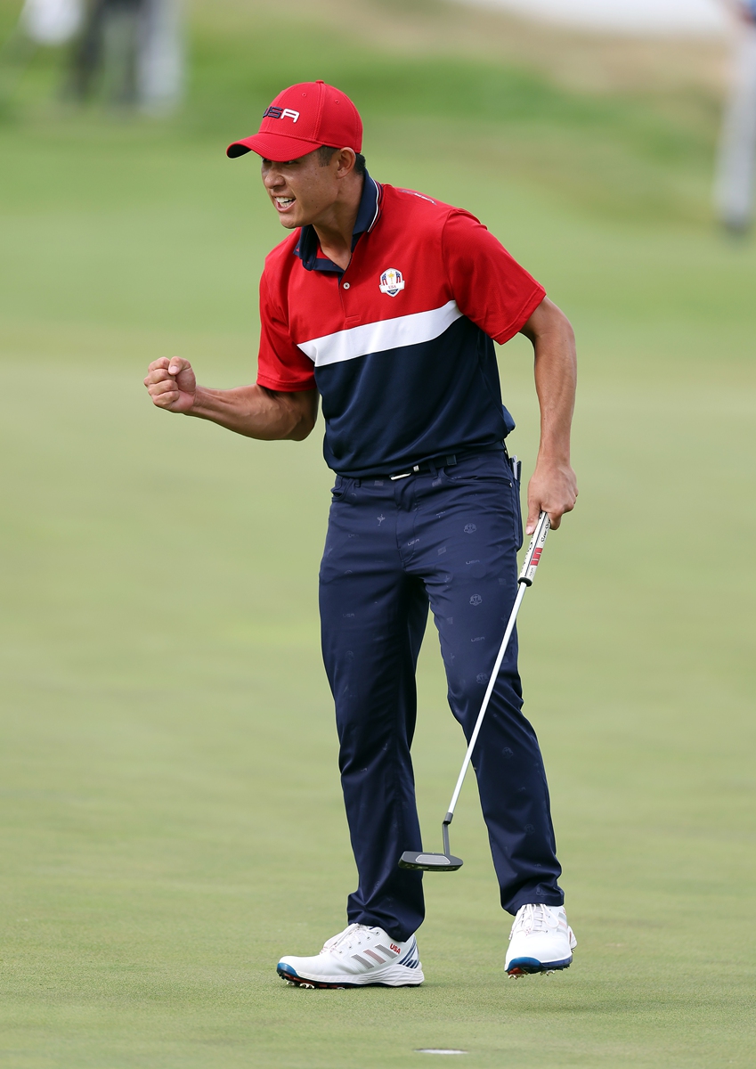 Collin Morikawa of the US celebrates on the 17th green during Sunday Singles Matches of the Ryder Cup.  Photo: VCG