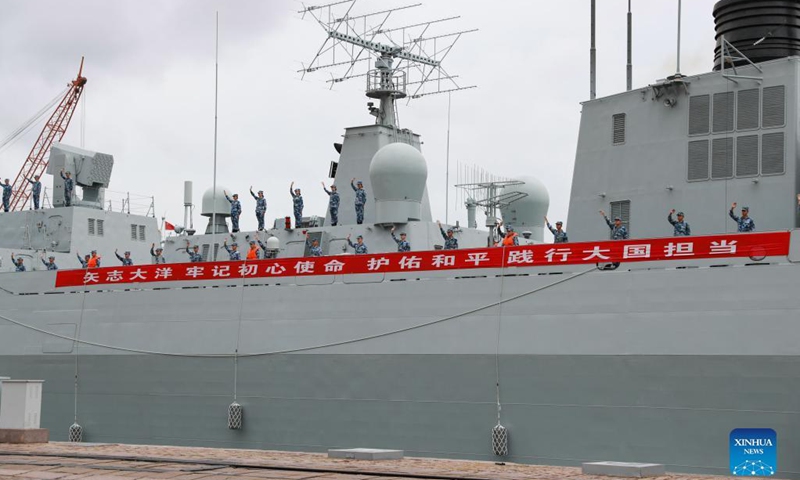 The 39th fleet of the Chinese People's Liberation Army (PLA) Navy sets out to conduct an escort mission in the Gulf of Aden and the waters off Somalia, at a port in Qingdao, east China's Shandong Province, Sept. 26, 2021. The fleet is composed of the guided-missile destroyer Urumqi, the missile frigate Yantai, and the supply ship Taihu, with dozens of special-operations soldiers and two helicopters on board. (Photo: Xinhua)