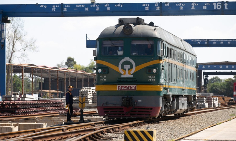 An engineering train runs in the China Railway No. 2 Engineering Group (CREC-2) railing base on the northern outskirts of Lao capital Vientiane, Feb. 10, 2021.(Photo: Xinhua)
