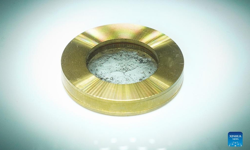 Photo taken on Sept. 26, 2021 shows the lunar soil brought back by China's moon mission during the 13th China International Aviation and Aerospace Exhibition, or Airshow China 2021, in Zhuhai, south China's Guangdong Province.Photo:Xinhua