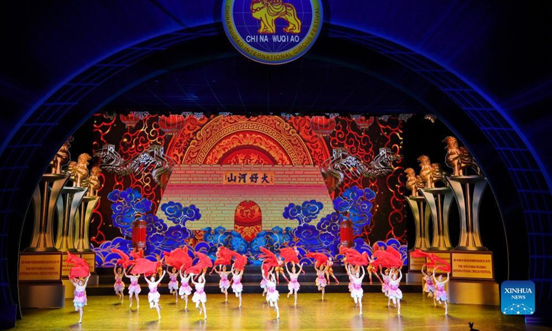 An acrobat performs at the opening ceremony of the 18th China Wuqiao International Circus Festival in Shijiazhuang, north China's Hebei Province, Sept. 28, 2021. The 18th China Wuqiao International Circus Festival kicked off Tuesday in Shijiazhuang. The three-day event will be held both online and offline in Shijiazhuang and Cangzhou of Hebei Province. Photo:Xinhua