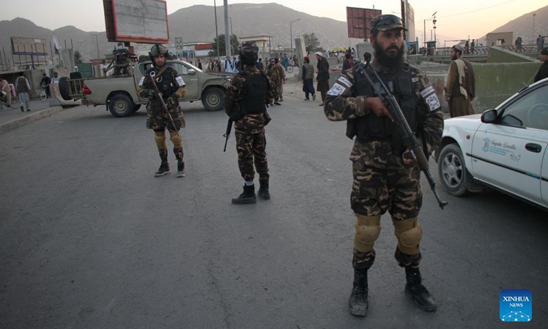 Afghan Taliban members stand guard at the site of a blast in Kabul, capital of Afghanistan, Oct. 3, 2021. At least two civilians were killed and four others wounded after an explosion occurred at the middle of a crowd outside a big mosque in Kabul, capital of Afghanistan, on Sunday, a Taliban spokesman confirmed.(Photo: Xinhua)