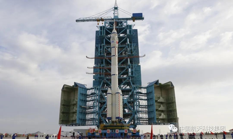 Combo of Shenzhou 13 manned spacecraft and Long March 2F Y13 rolls out to launch pad Photo: CASC