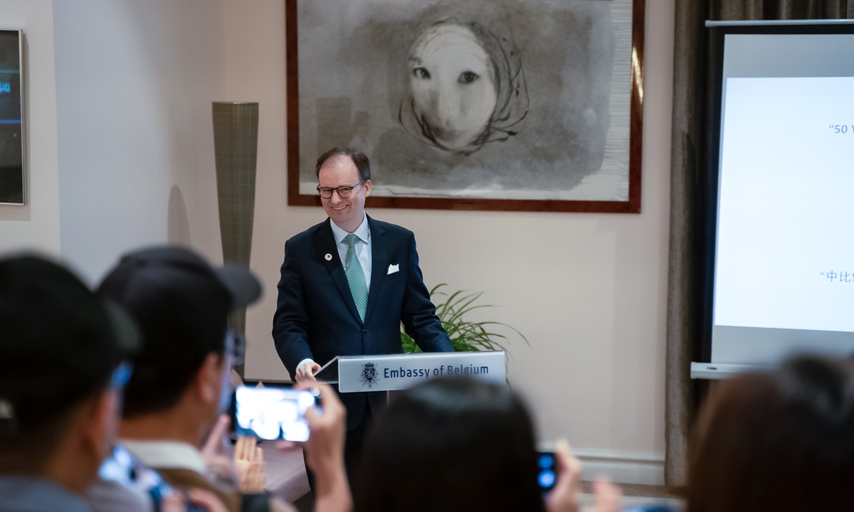 Belgian Ambassador to China H.E. Dr. Jan Hoogmartens dilivers a sppech at his residence in Beijing on September 24 during the 