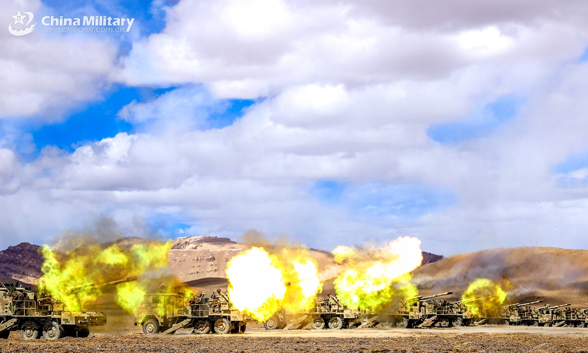 Truck-mounted self-propelled howitzers assigned to a combined-arms regiment under the PLA Xinjiang Military Command fire at targets during a live-fire training exercise in mid September, 2021.Photo:China Military