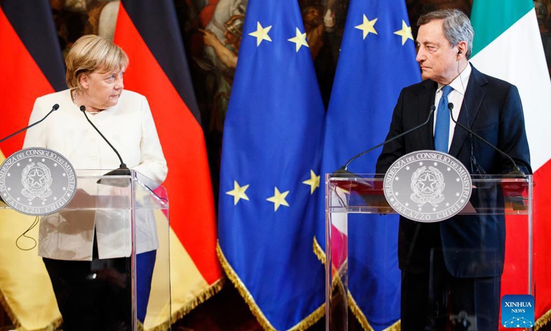 Italian Prime Minister Mario Draghi (R) and visiting German Chancellor Angela Merkel attend a joint press conference in Rome, Italy, on Oct. 7, 2021. Italian Prime Minister Mario Draghi on Thursday thanked outgoing German Chancellor Angela Merkel for playing a decisive role in shaping the future of the European Union (EU).Photo:Xinhua