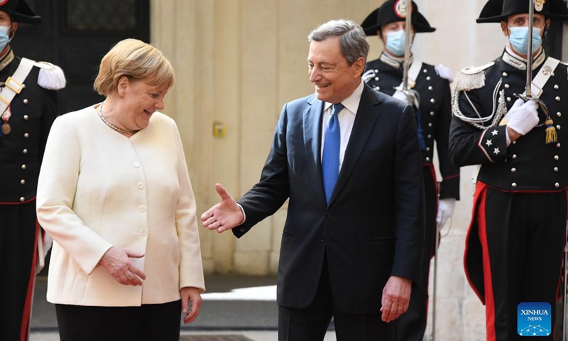 Italian Prime Minister Mario Draghi (R, Front) welcomes visiting German Chancellor Angela Merkel (L, Front) in Rome, Italy, on Oct. 7, 2021. Italian Prime Minister Mario Draghi on Thursday thanked outgoing German Chancellor Angela Merkel for playing a decisive role in shaping the future of the European Union (EU).Photo:Xinhua