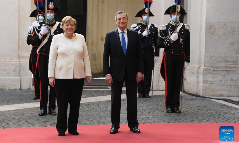Italian Prime Minister Mario Draghi (R, Front) welcomes visiting German Chancellor Angela Merkel (L, Front) in Rome, Italy, on Oct. 7, 2021. Italian Prime Minister Mario Draghi on Thursday thanked outgoing German Chancellor Angela Merkel for playing a decisive role in shaping the future of the European Union (EU).Photo:Xinhua