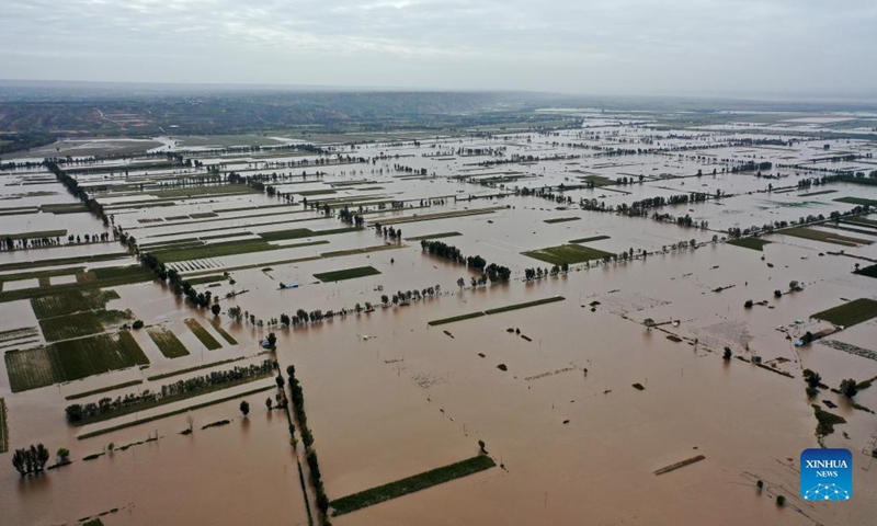 Aerial photo taken on Oct. 10, 2021 shows the flood-affected Yellow River beach near Lianbo Village in Hejin City, north China's Shanxi Province. (Xinhua/Zhan Yan)