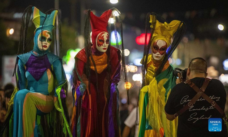Participants pose for photos during the parade of Ayia Napa Medieval Festival in Ayia Napa, Cyprus, on Oct. 9, 2021.Photo: Xinhua