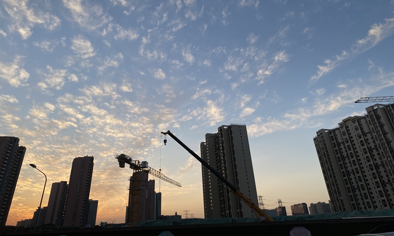 Cranes are seen at a construction site of a housing complex in Beijing on Thursday. Photo: VCG