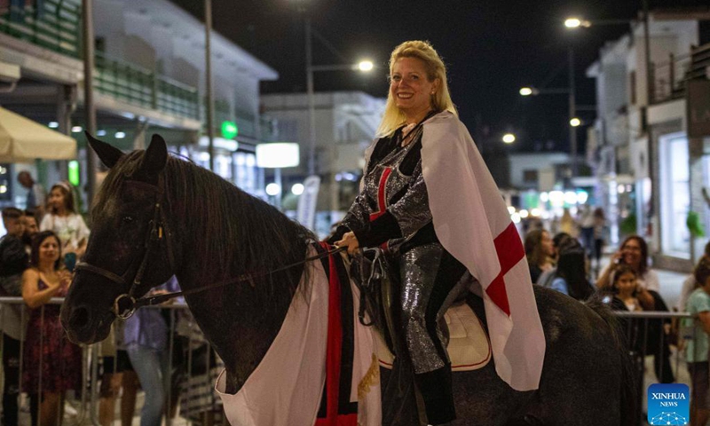 A woman rides a horse during the parade of Ayia Napa Medieval Festival in Ayia Napa, Cyprus, on Oct. 9, 2021.Photo: Xinhua