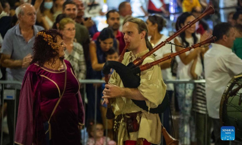 A participant performs during the parade of Ayia Napa Medieval Festival in Ayia Napa, Cyprus, on Oct. 9, 2021.Photo: Xinhua