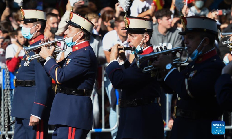 Soldiers attend a parade to celebrate the National Day of Spain in Madrid, Spain, Oct. 12, 2021. (Photo by Gustavo Valiente/Xinhua)