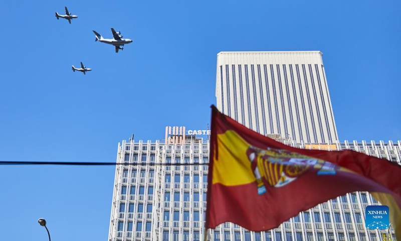 Aircrafts fly at a parade to celebrate the National Day of Spain in Madrid, Spain, Oct. 12, 2021. (Xinhua/Meng Dingbo)